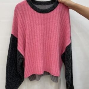 Sweater bicolor rosa y negro