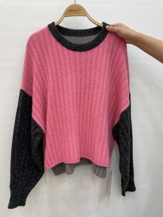 Sweater bicolor rosa y negro