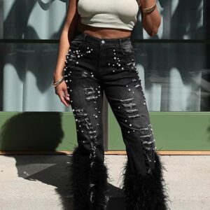 Jean negro con perlas y plumas