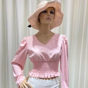 Blusa rosada con mangas abullonadas